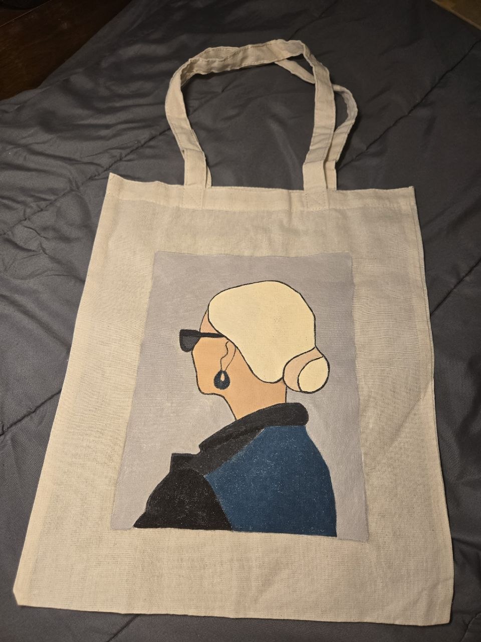 Canvas tote with a hand-painted woman in profile